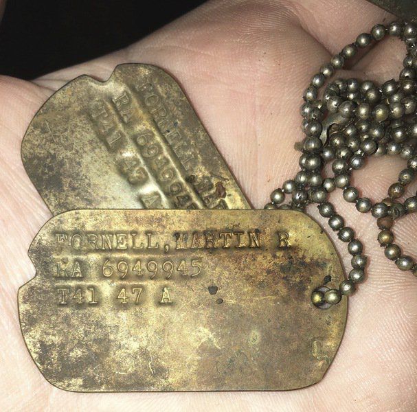 Watery find reunites family with dog tags lost decades ago